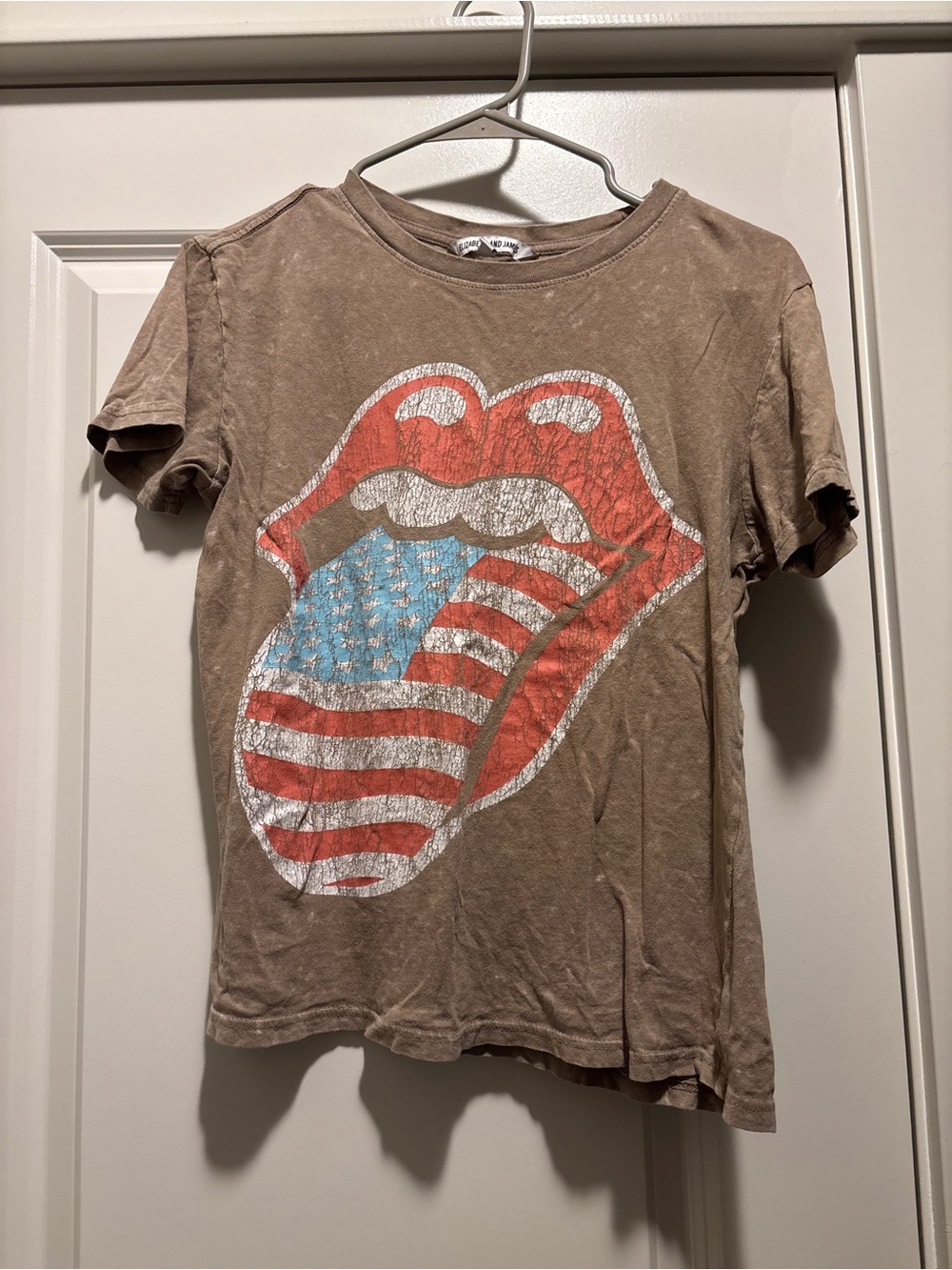 Vintage-Inspired Brown Graphic Tee with American Flag Tongue